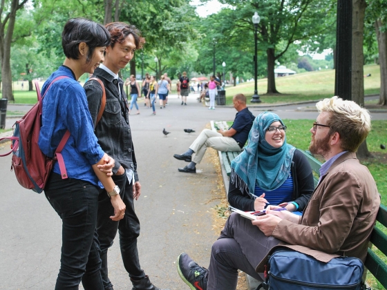 Artists Tita and Irwan engaging a pair of friends in Boston Common Artists Tita and Irwan engaging a pair of friends in Boston Common