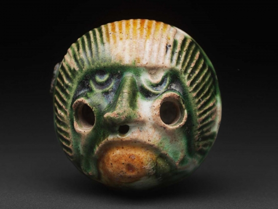 Terracotta bead in the form of monkey head Terracotta bead in the form of monkey head