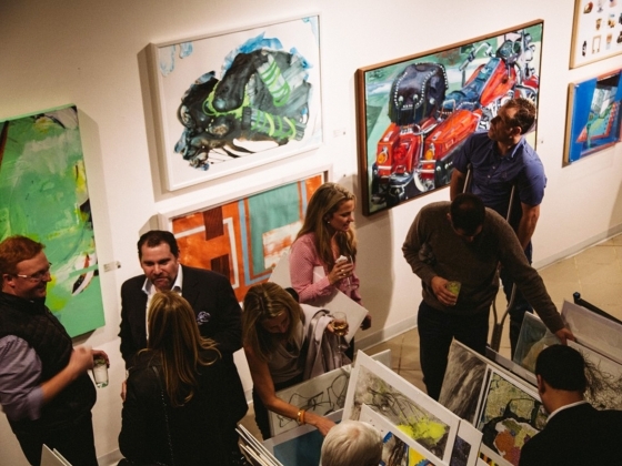 Members looking at art at the SMFA Art Sale Preview