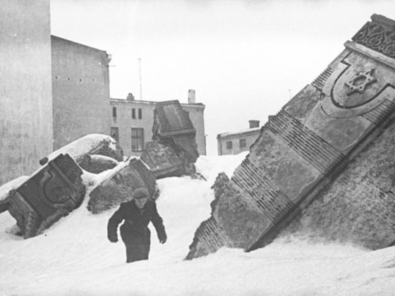 enryk Ross, Lodz Ghetto: Man walking in winter in the ruins of the synagogue on Wolborska street (destroyed by Germans 1939) enryk Ross, Lodz Ghetto: Man walking in winter in the ruins of the synagogue on Wolborska street (destroyed by Germans 1939)