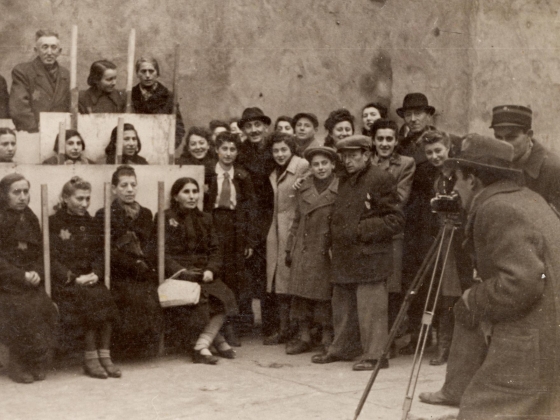 Photograph of Henryk Ross photographing for identification cards